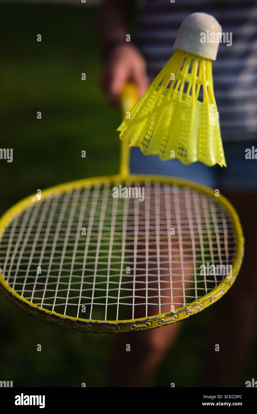 badminton shuttlecock on a racket close-up Stock Photo