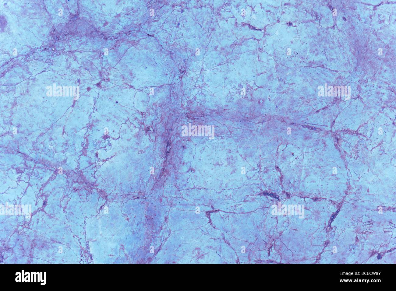 A striking blue textured surface showcasing intricate natural patterns resembling marble or stone. The design features subtle variations in color with Stock Photo