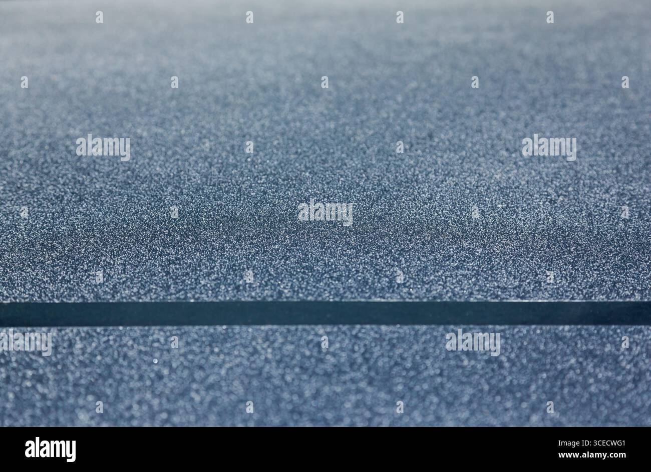 Dark blue matte finish with glossy stripe at the bottom. Stock Photo