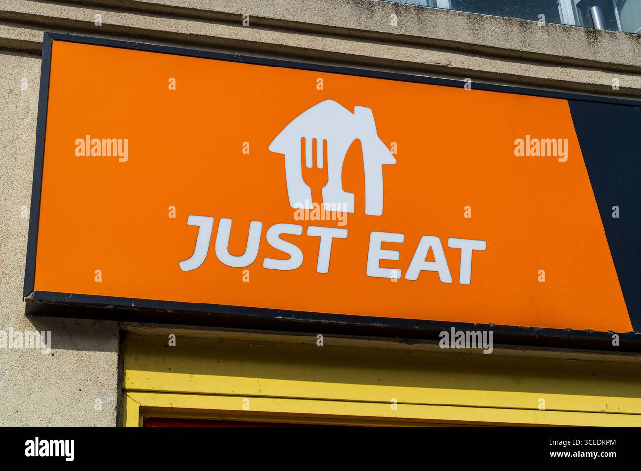 Wolverhampton, UK - August 13th 2025: External signage of Just Eat, a food delivery company Stock Photo
