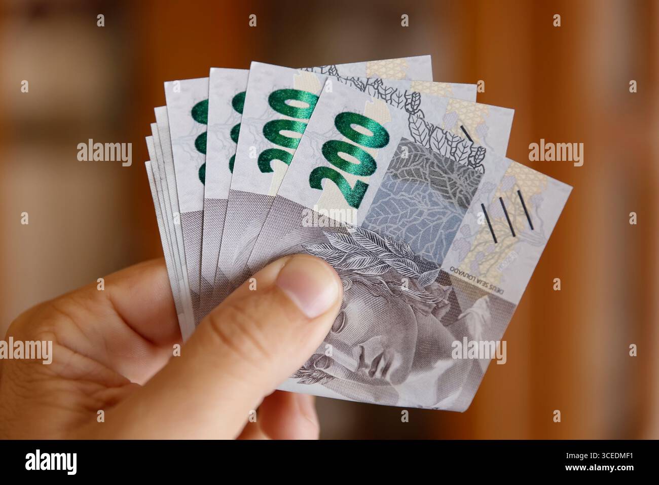 brazilian money currency 200 reais Stock Photo - Alamy