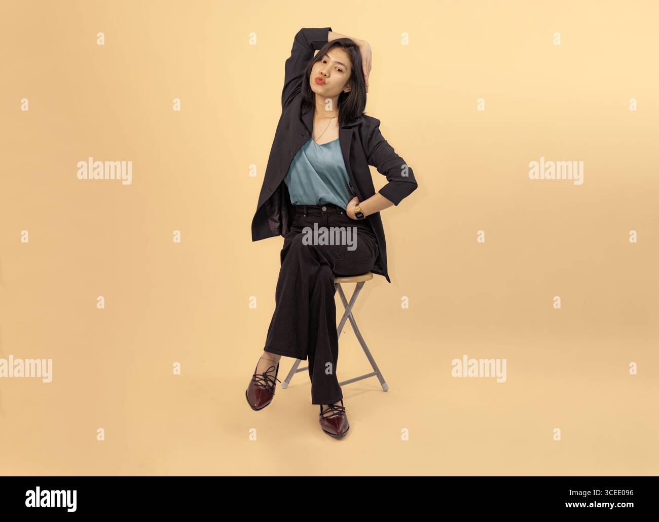 Professional woman in black suit hi-res stock photography and images ...