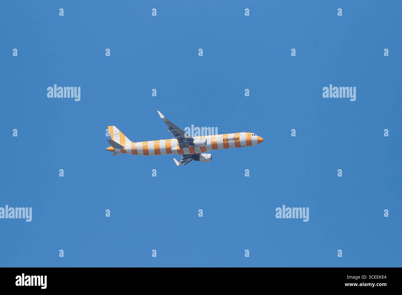 Condor Airplane With Yellow And White Stripes Over Mainz
