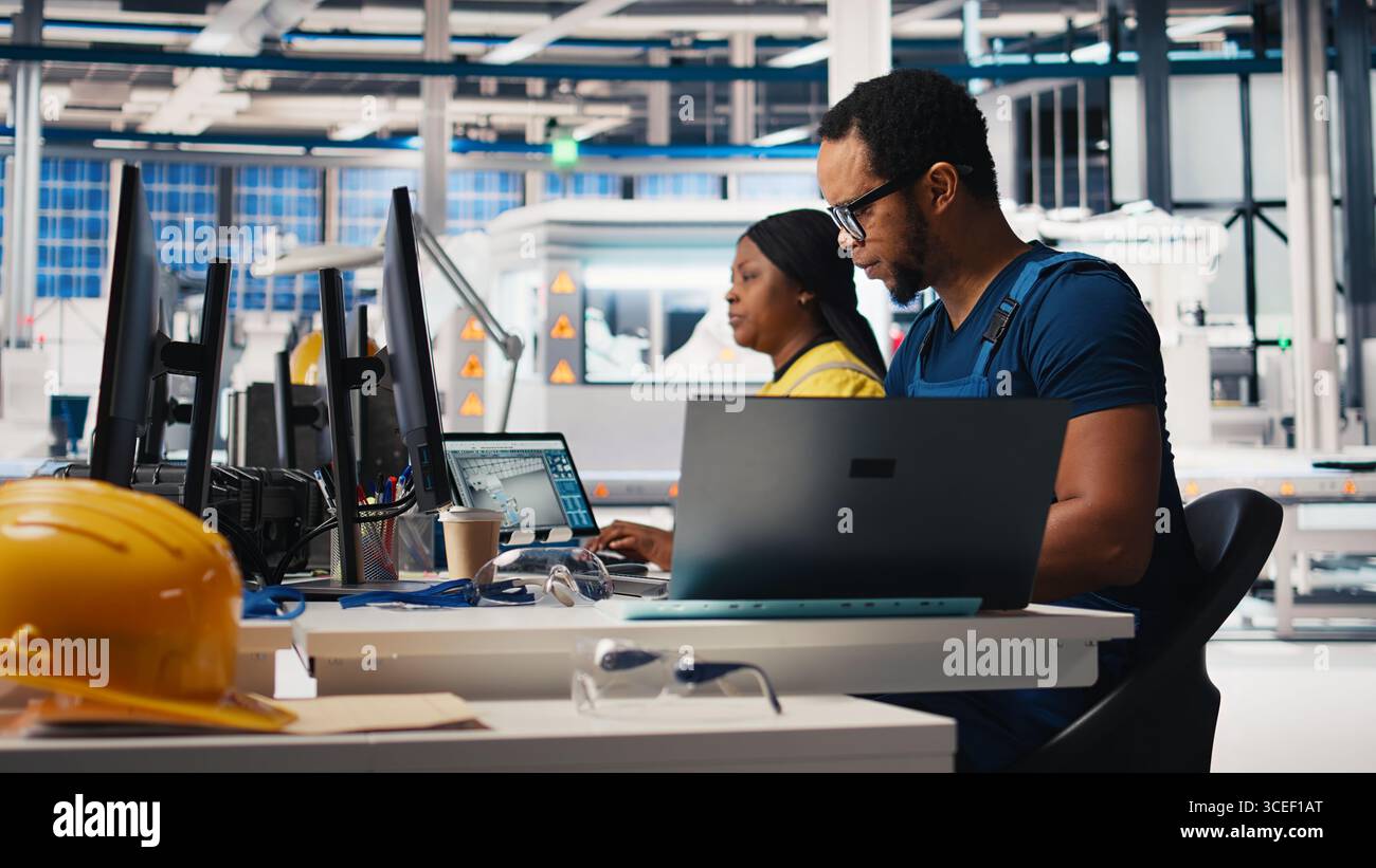 Employee works on computer solar hi-res stock photography and images ...