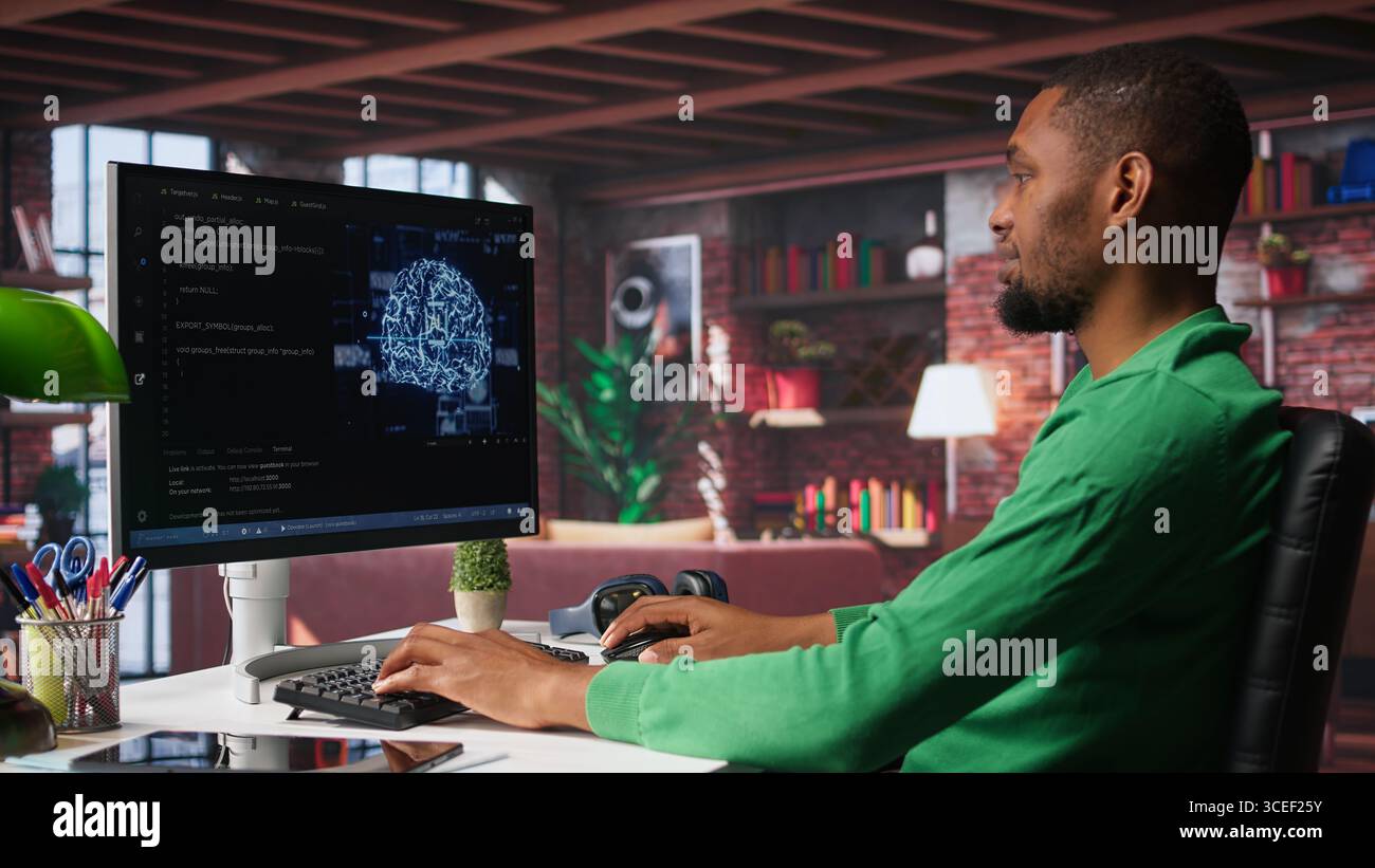 African american engineer coding a neural network AI brain model for machine learning and deep learning, solving IT support tasks on pc. Debugging software and checking for errors. Camera B. Stock Photo