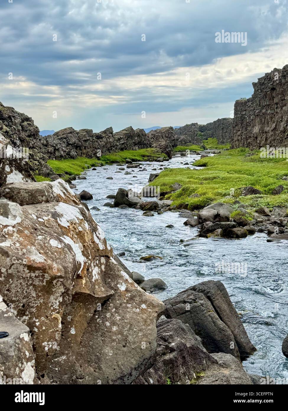 Drekkingarhylur, known as the Drowning Pool, and the Oxara river. - Smartphone Captured Stock Image