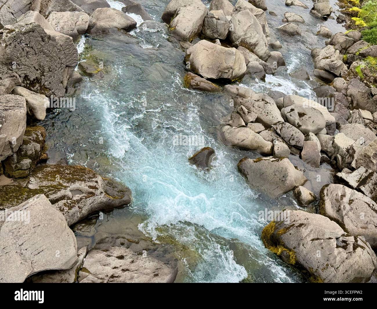 Drekkingarhylur, known as the Drowning Pool, and the Oxara river. - Smartphone Captured Stock Image