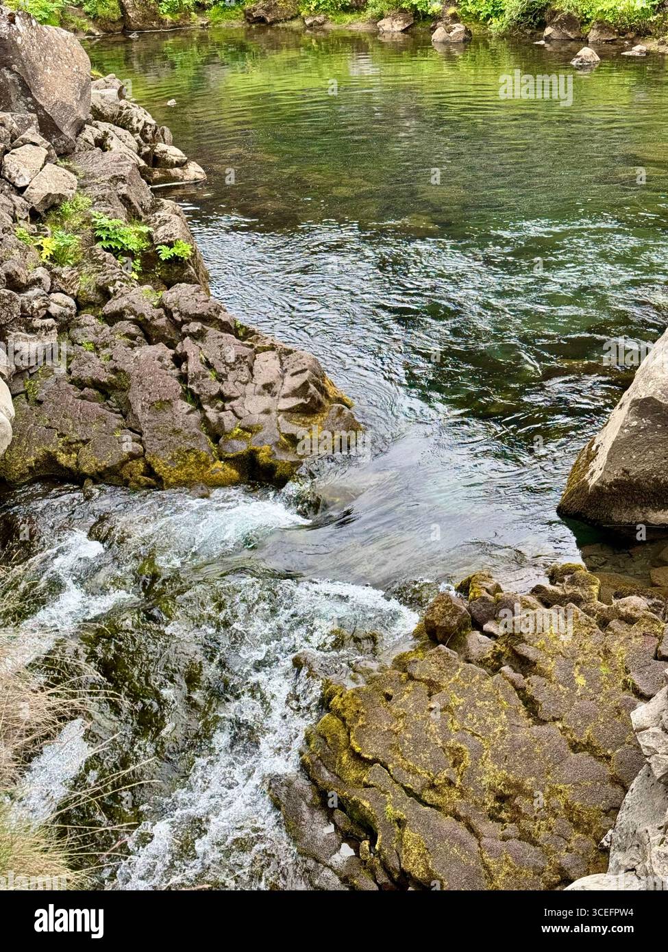 Drekkingarhylur, known as the Drowning Pool, and the Oxara river. - Smartphone Captured Stock Image
