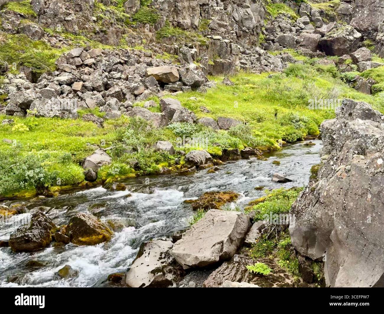 Drekkingarhylur, known as the Drowning Pool, and the Oxara river. - Smartphone Captured Stock Image