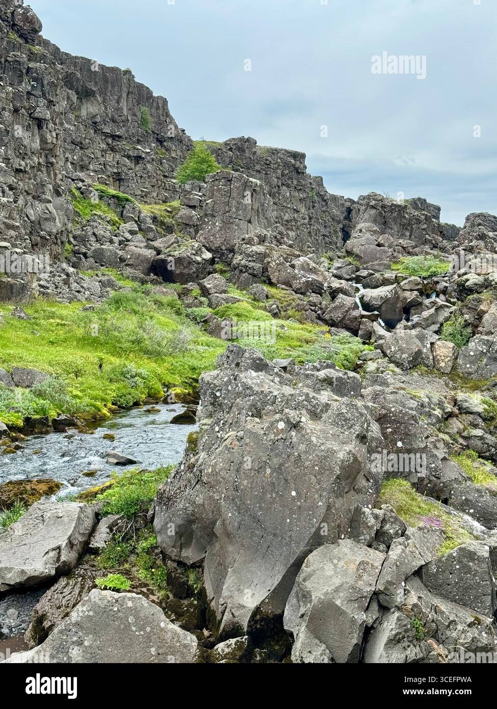 Drekkingarhylur, known as the Drowning Pool, and the Oxara river. - Smartphone Captured Stock Image