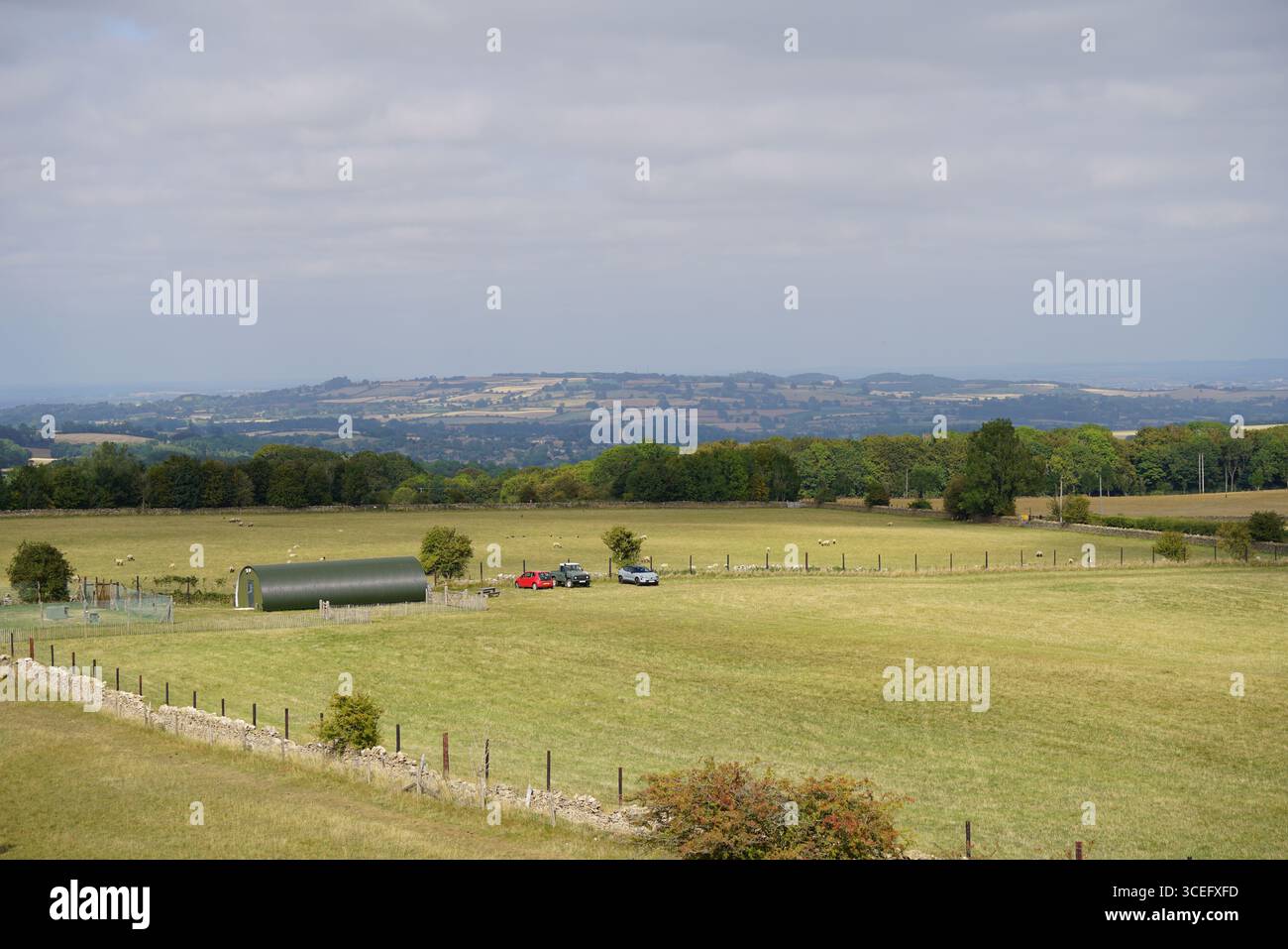 Scenic Countryside Landscape with Rolling Hills, Open Fields, and Farm ...