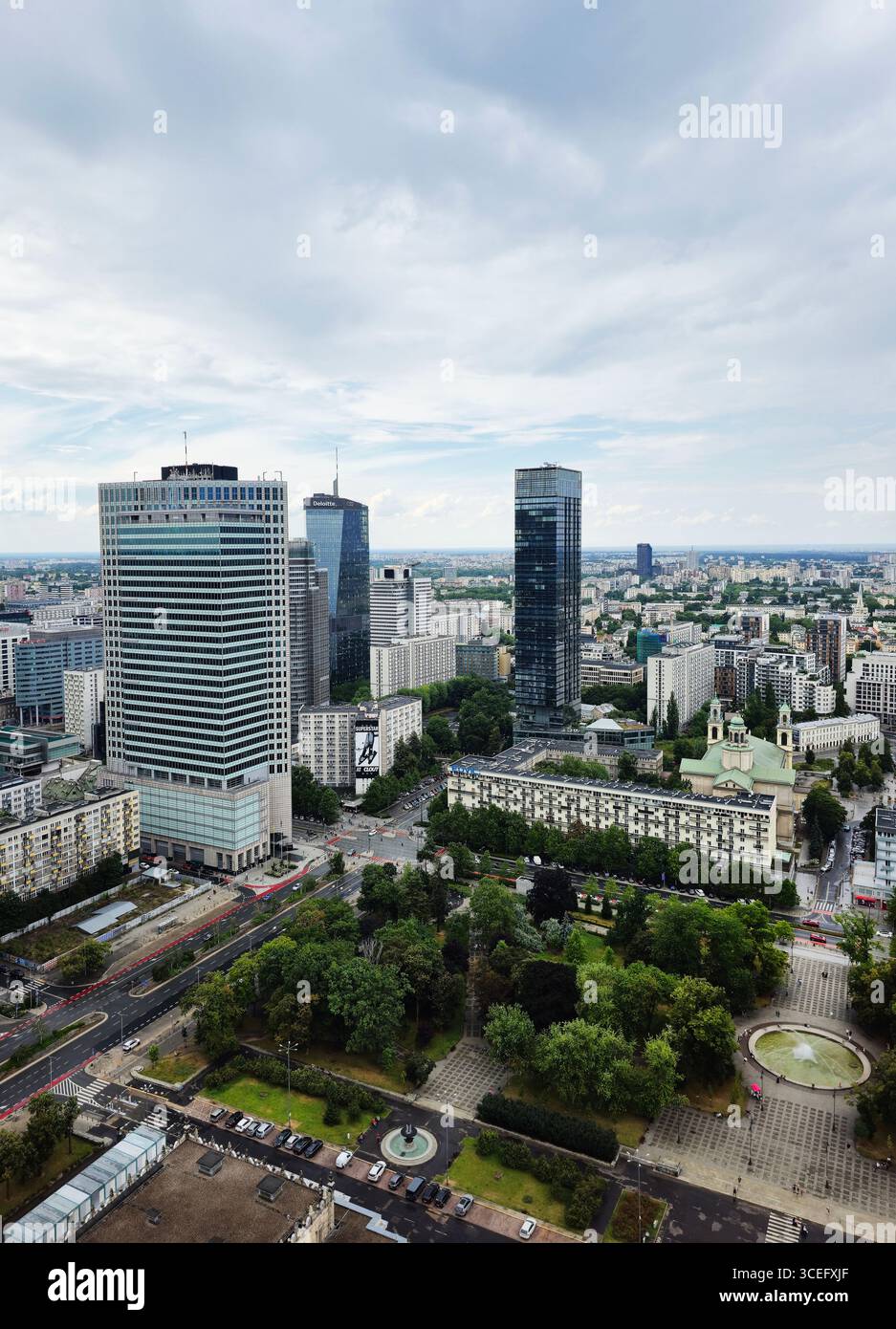 A view of Świętokrzyska park and the modern skyline behind it in Warsaw, Poland. - Smartphone Captured Stock Image