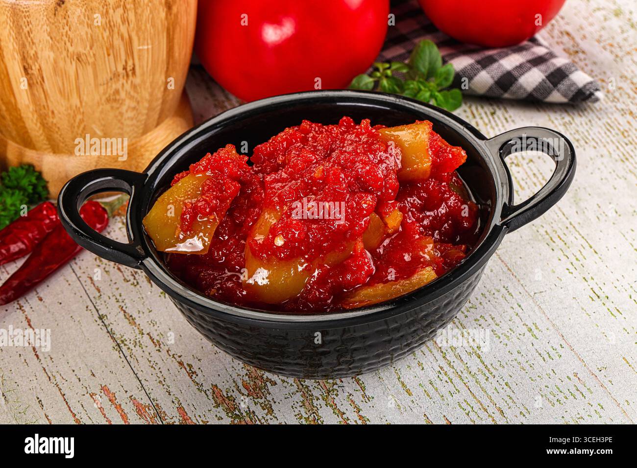 Hungarian vegetarian Lecho with bell pepper and tomato Stock Photo - Alamy