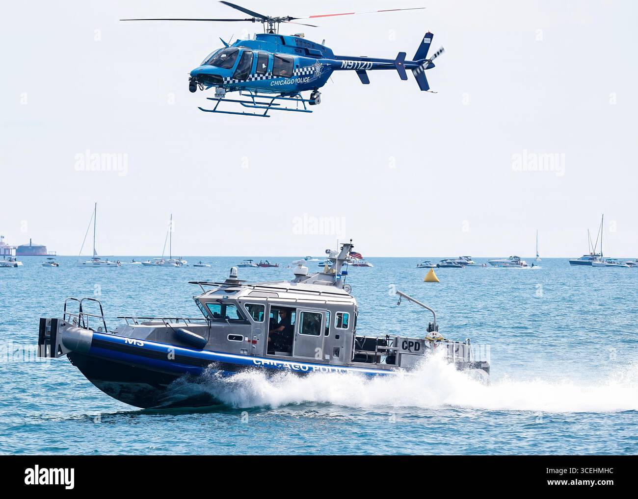 Water Rescues Chicago Chicago, USA. 17th Aug, 2025. A helicopter and water rescue team of ...