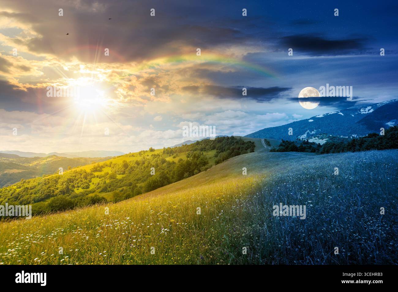 mountain landscape with wide meadow on summer solstice with sun and moon. grass on the pasture rolling through hills in countryside scenery to distant Stock Photo