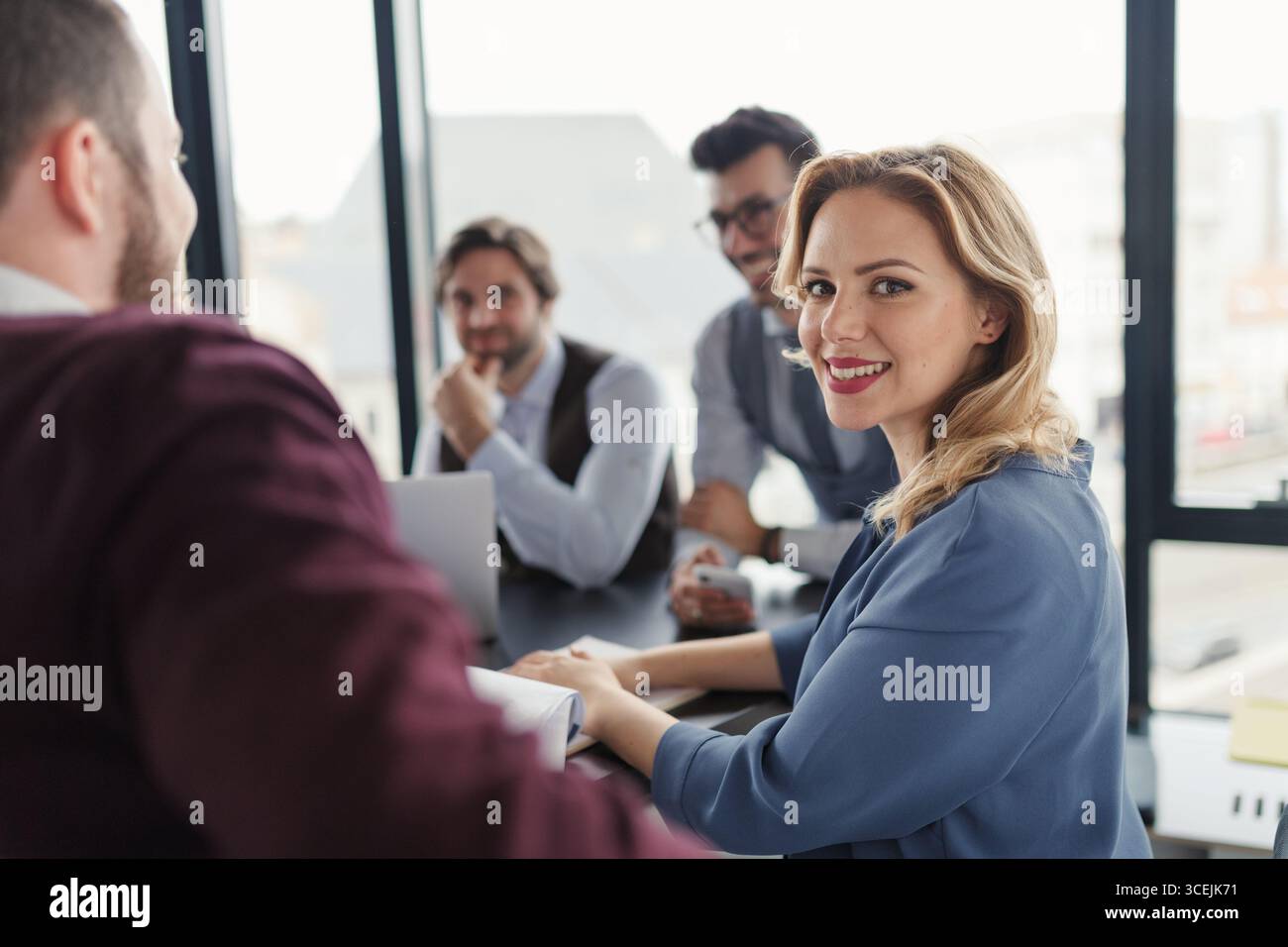 Group of coworkers discussing project strategy. Stock Photo