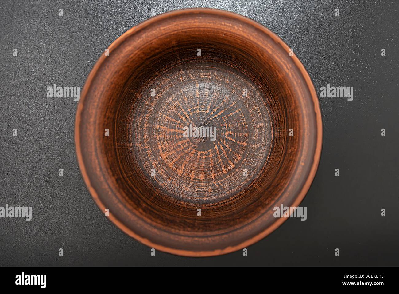 Clay bowl isolated on black background Stock Photo