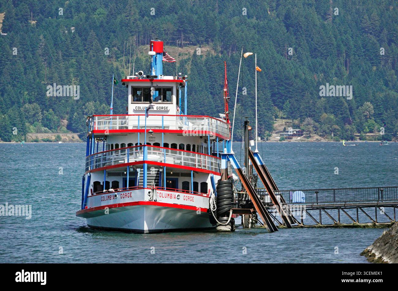 A small passenger-carrying steamship paddle-wheeler carries passengers on short tours of the Columbia River Gorge on the Columbia river, Oregon. Stock Photo