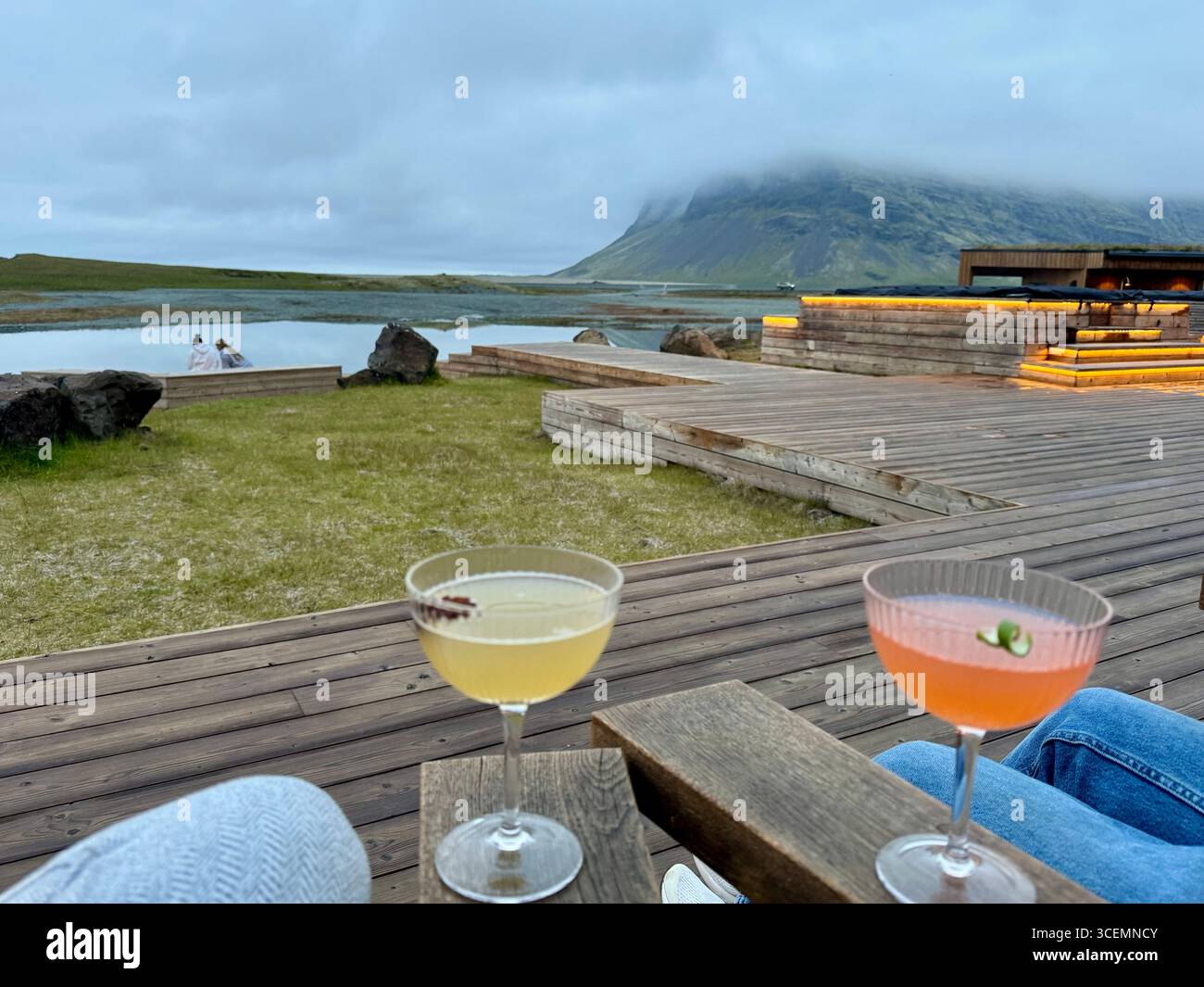 Sipping cocktails in the evening a hotel in Suðursveit, Iceland with calming  scenery. - Smartphone Captured Stock Image