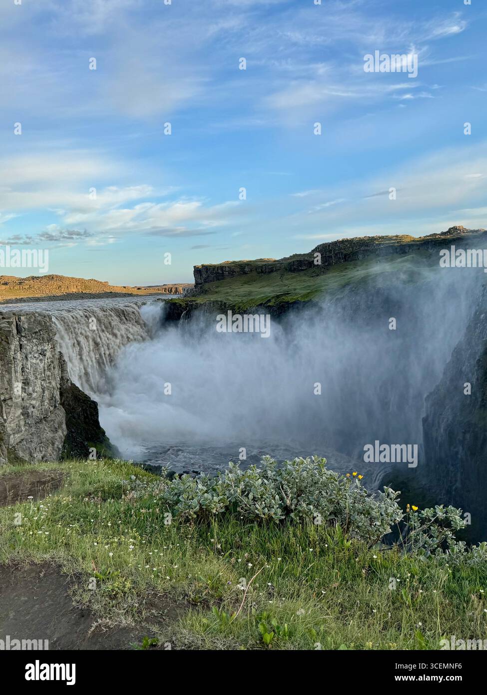 Water spray at as the rushing melt water falls into the canyon at Dettifoss. - Smartphone Captured Stock Image