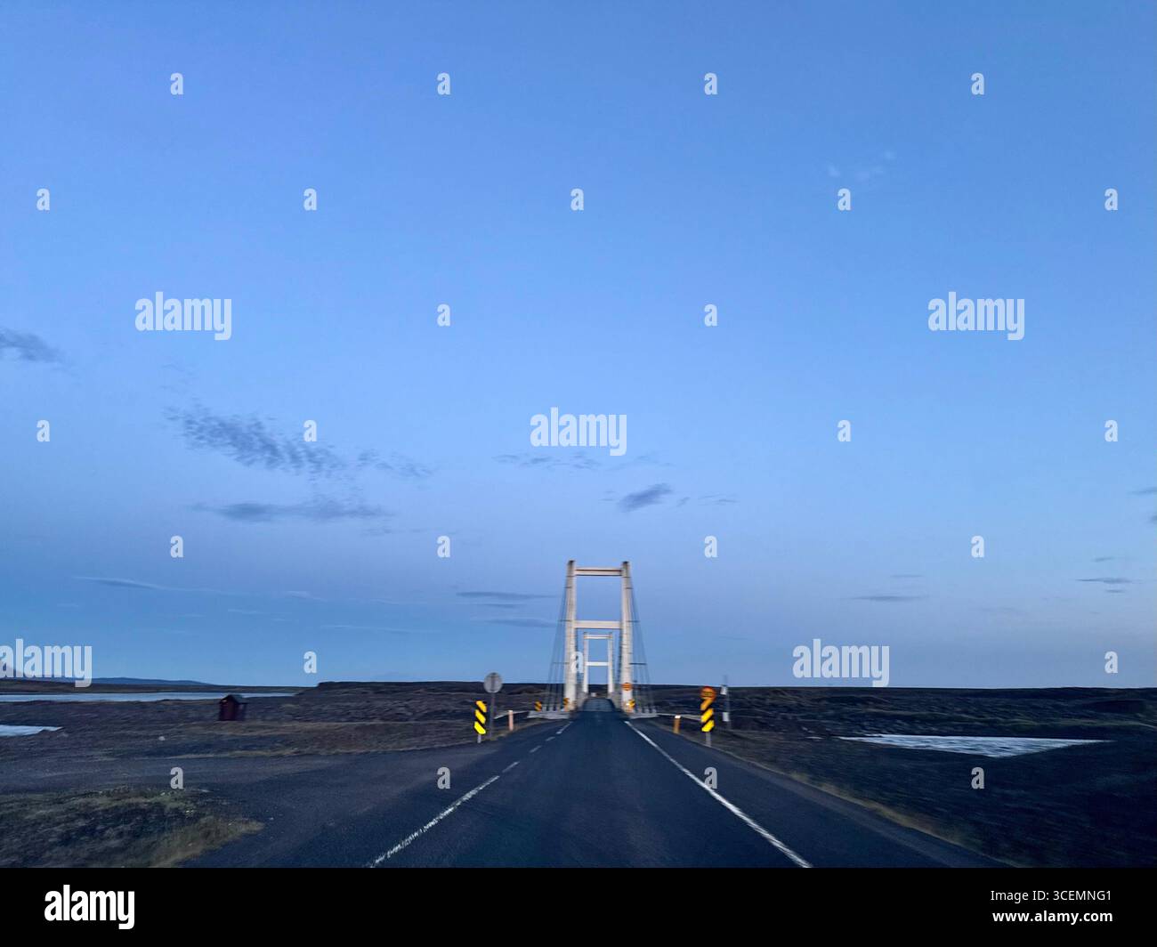 A one lane suspension bridge over Jökulsá á Fjöllum river on the Ring Road in northeast Iceland - Smartphone Captured Stock Image