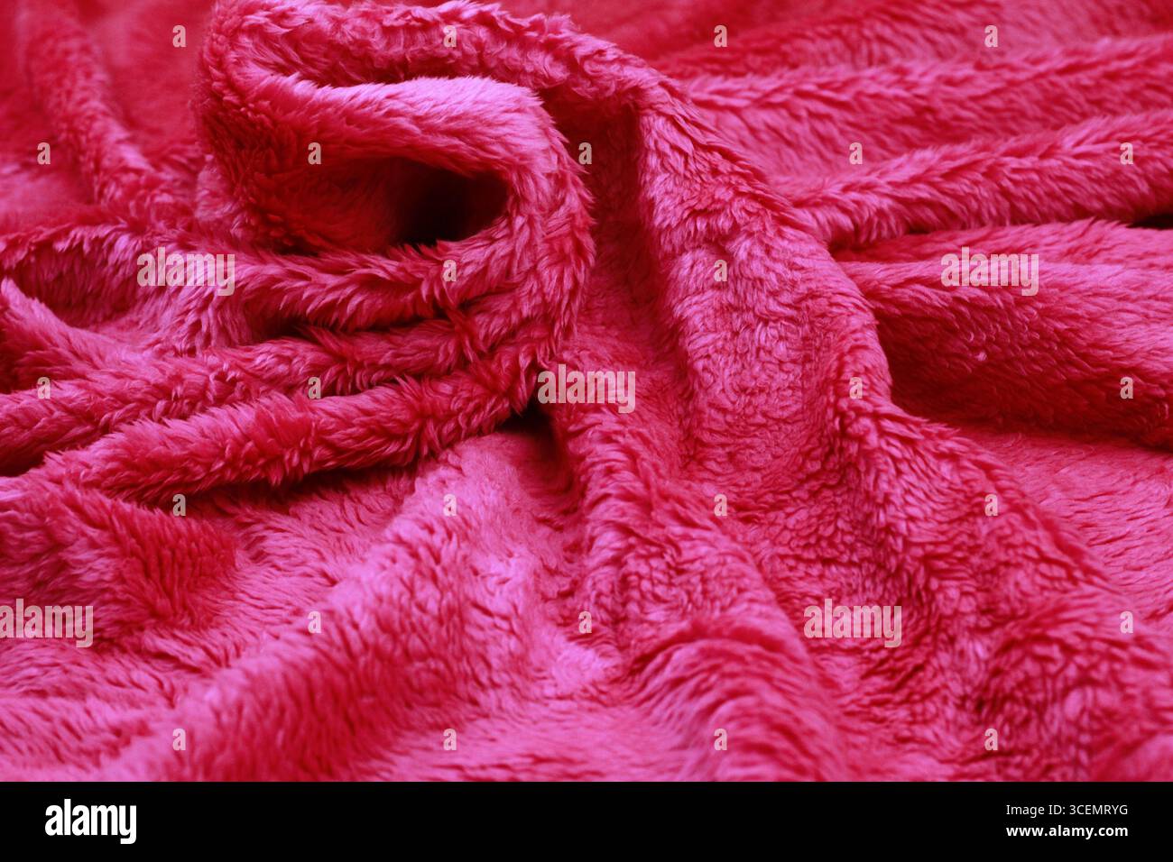 Overlay of red fiber cloth texture. Close-up view. Stock Photo