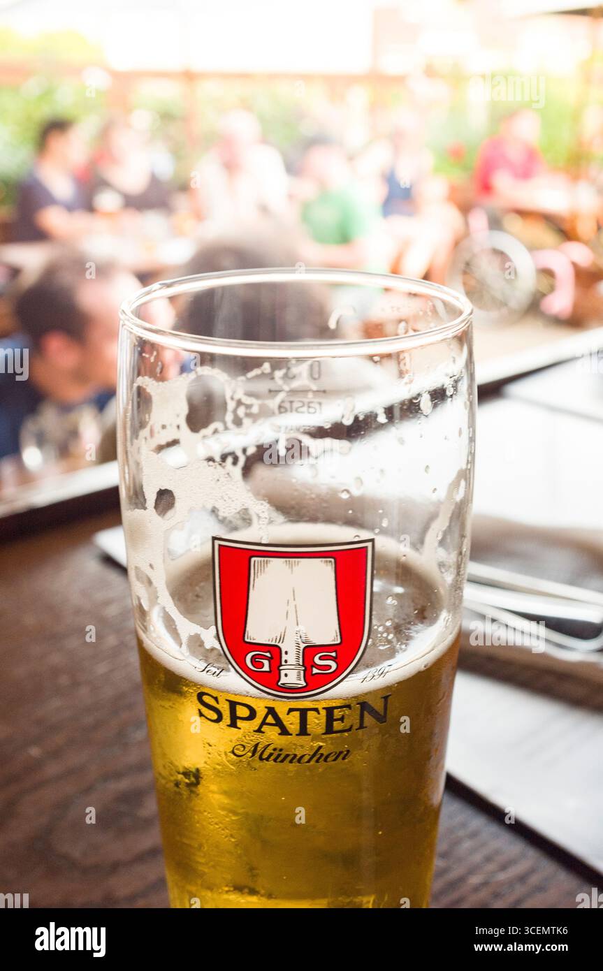 Spaten Glass half full of beer, Prost!, 4237 N. Mississippi Avenue, Portland, Multnomah County, Oregon, USA Stock Photo