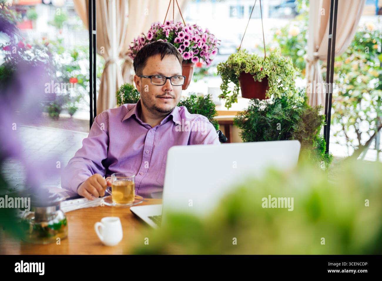 Businessman Working on Laptop in Cafe, Business Person Work At Hotel Table, Stock Photo