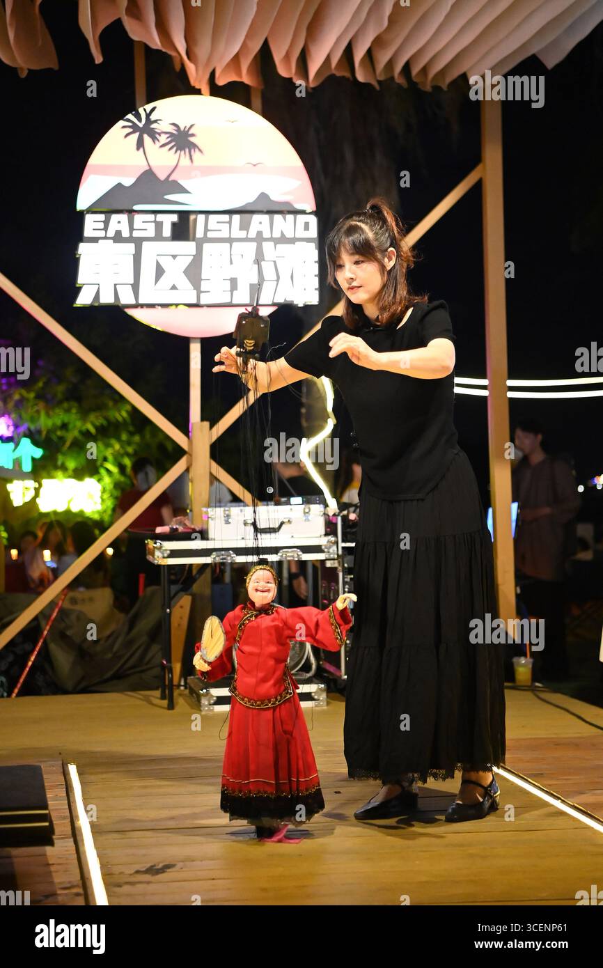 (250819) -- QUANZHOU, Aug. 19, 2025 (Xinhua) -- Actress Wu Xiaohui ...