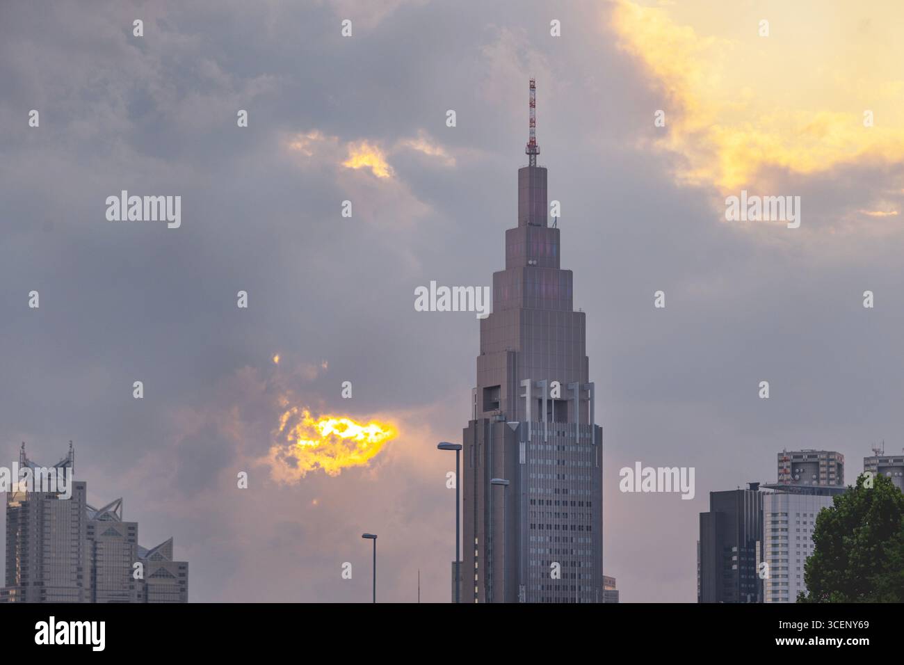 Docomo Tower - the tallest clock tower and home to a telecommication company, photographed at sunset, August 2025, Tokyo, Japan - Stock Image
