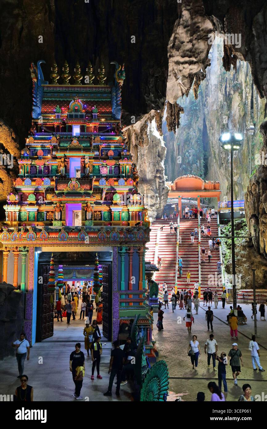 BATU CAVES, MALAYSIA - MARCH 17, 2024: Pilgrims visit Batu Caves temple ...