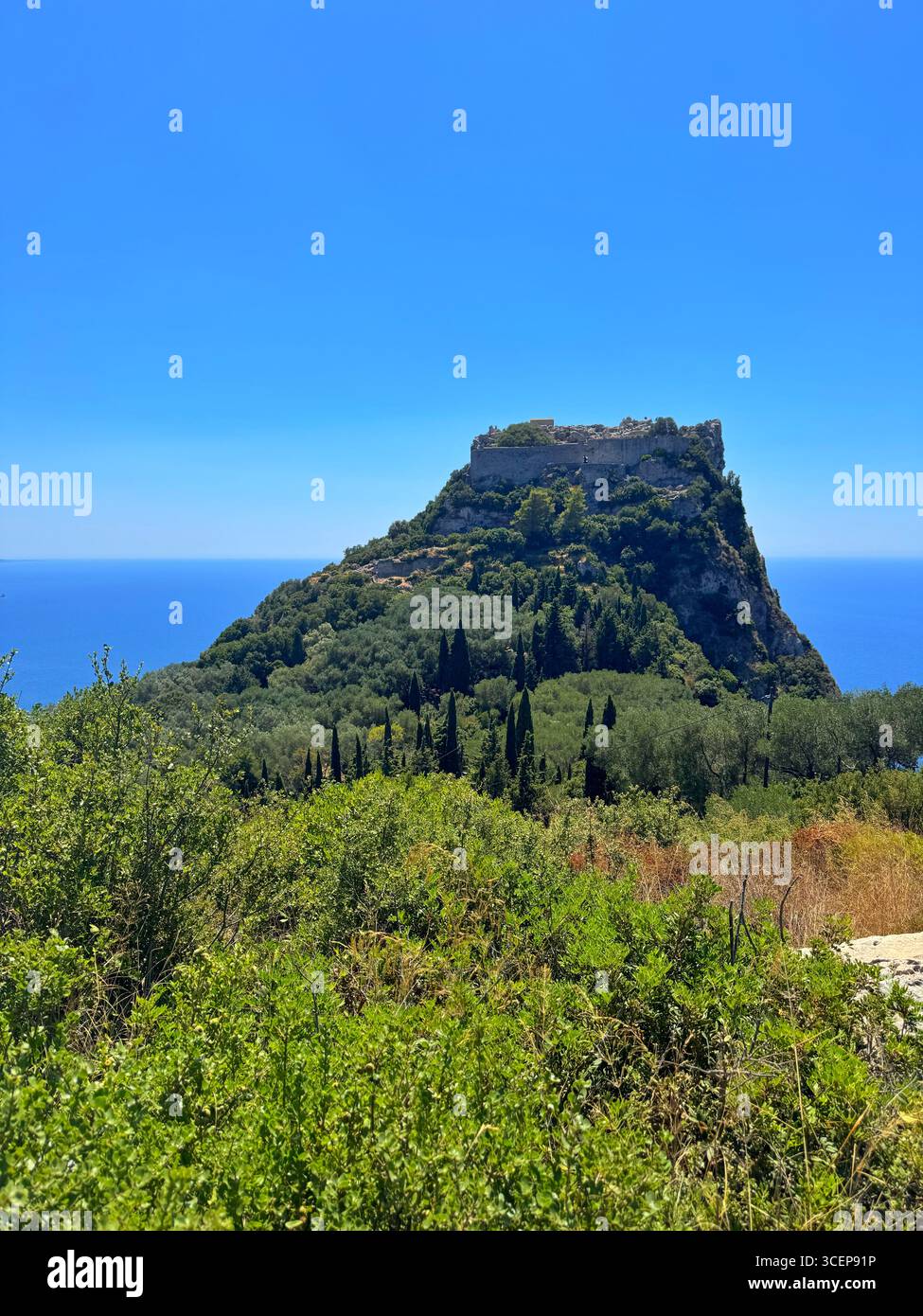 Angelokastro Castle as seen from Krini village, Corfu, Greece. - Smartphone Captured Stock Image