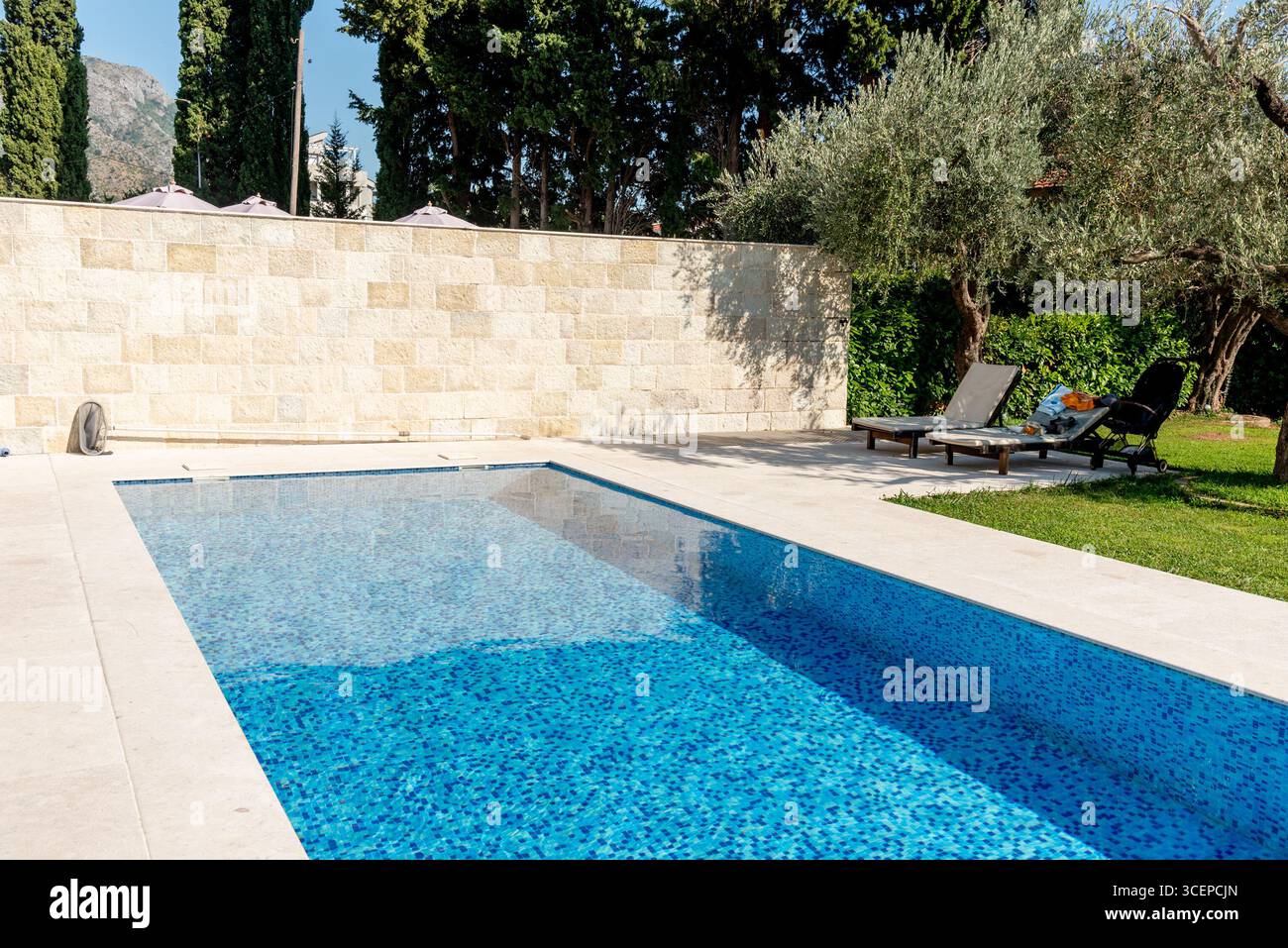 Wate Pool Outside outdoor pool with blue wate in the backyard of country house ...