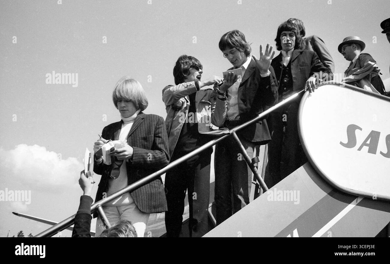 Members of Rolling Stones (Brian Jones, Keith Richards, Mick Jagger, Bill Wyman, Charlie Watts) arrives at the Airport in Fornebu, the day before the concert at Messehallen, Skøyen, Norway 1965. Photo by Øderud Stock Photo