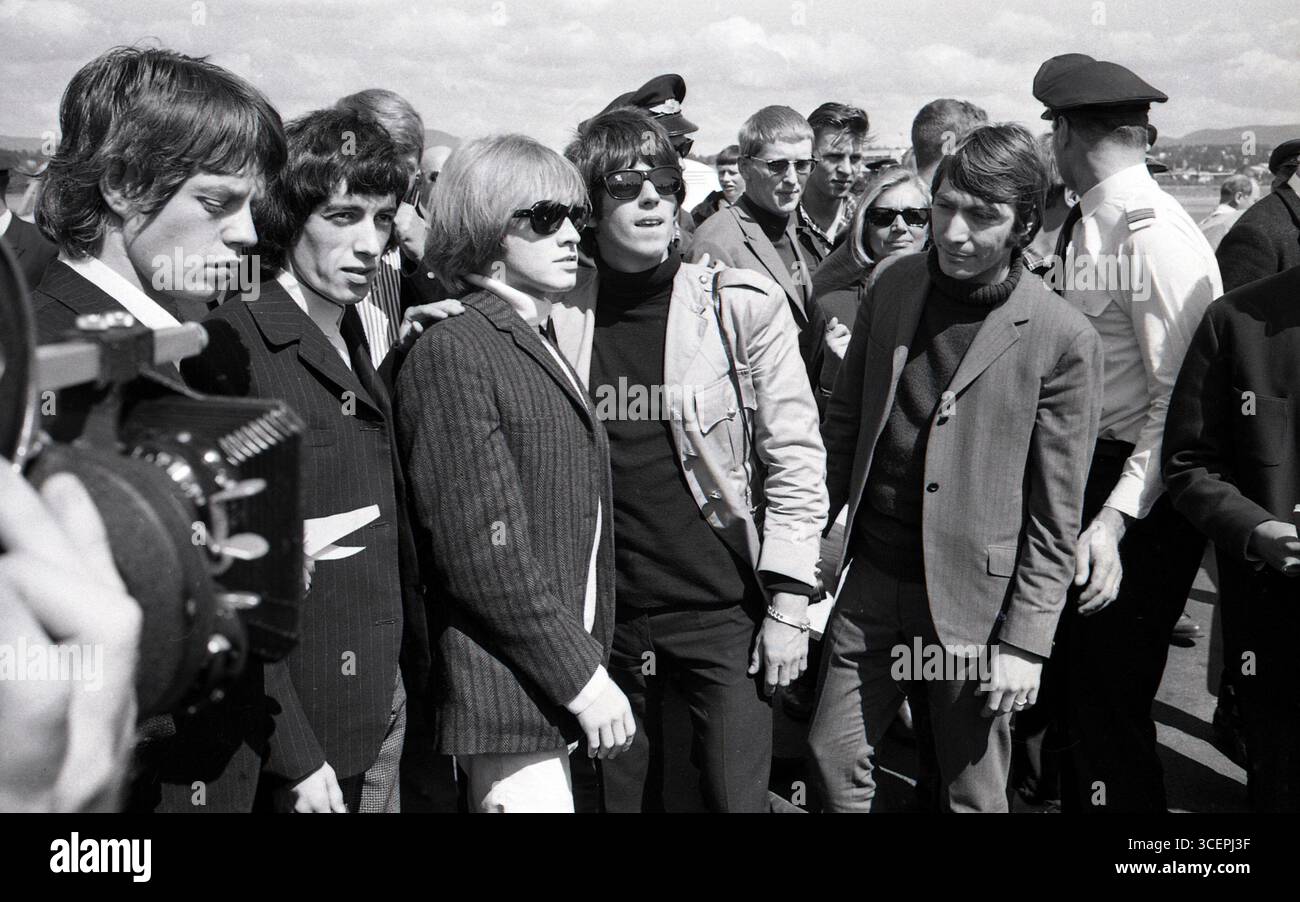 Members of Rolling Stones (Mick Jagger, Bill Wyman, Brian Jones, Keith Richards, Charlie Watts) arrives at the Airport in Fornebu, the day before the concert at Messehallen, Skøyen, Norway 1965. Photo by Øderud Stock Photo