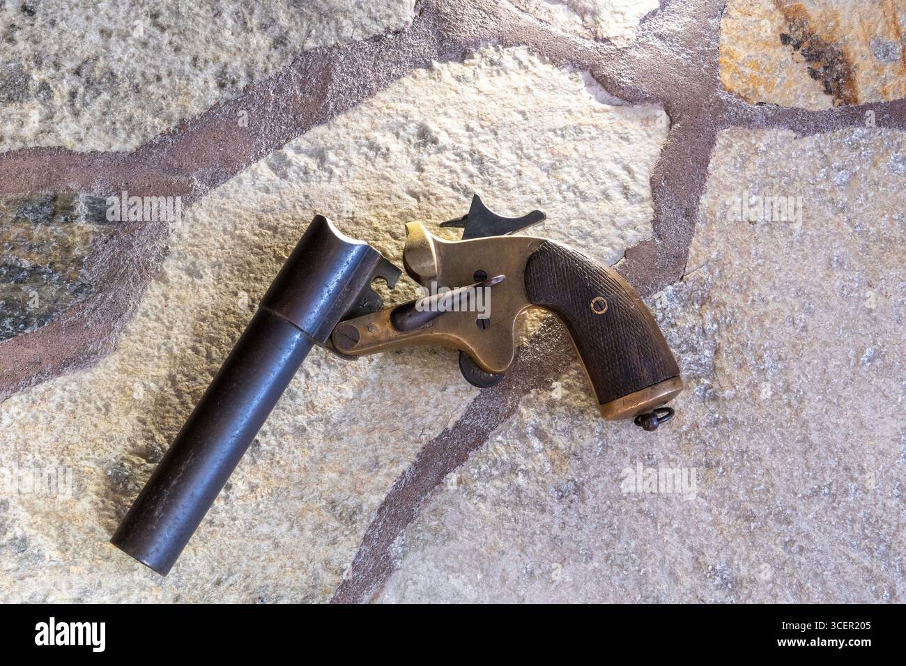 Still of WW2 Flare Pistol on a Stone Slate Floor, 2025, USA Stock Photo
