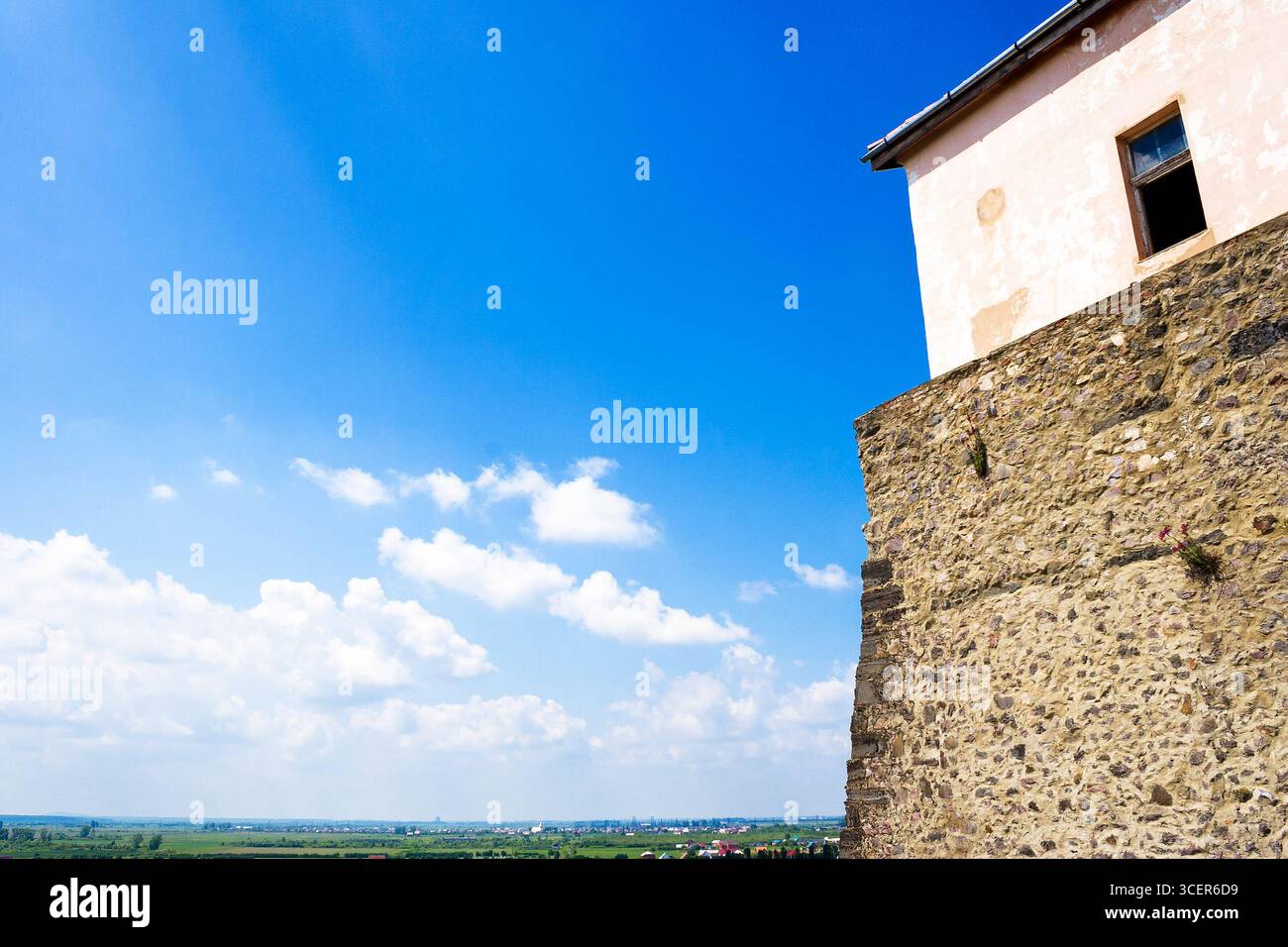 mukachevo, ukraine - may 25, 2008: palanok castle in summertime. old fortification now serves as the museum and is popular tourist landmark of transca Stock Photo