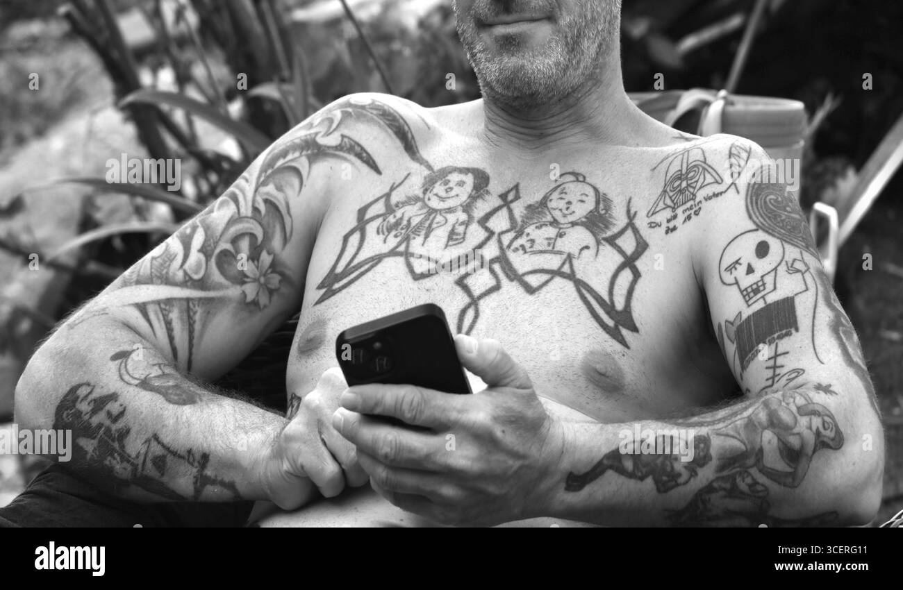 Tattoos on the chest and arms of a young man, black and white, Baden-Wuerttemberg, Germany Stock Photo