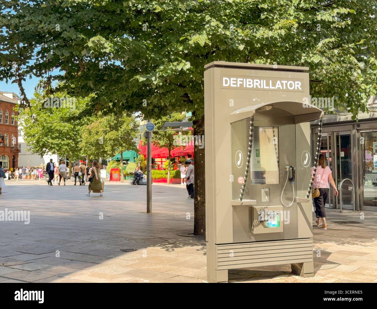 Cardiff, Wales, UK - 15 August 2025: Defibrillator unit in the pedestrian shopping are in Cardiff city centre - Smartphone Captured Stock Image