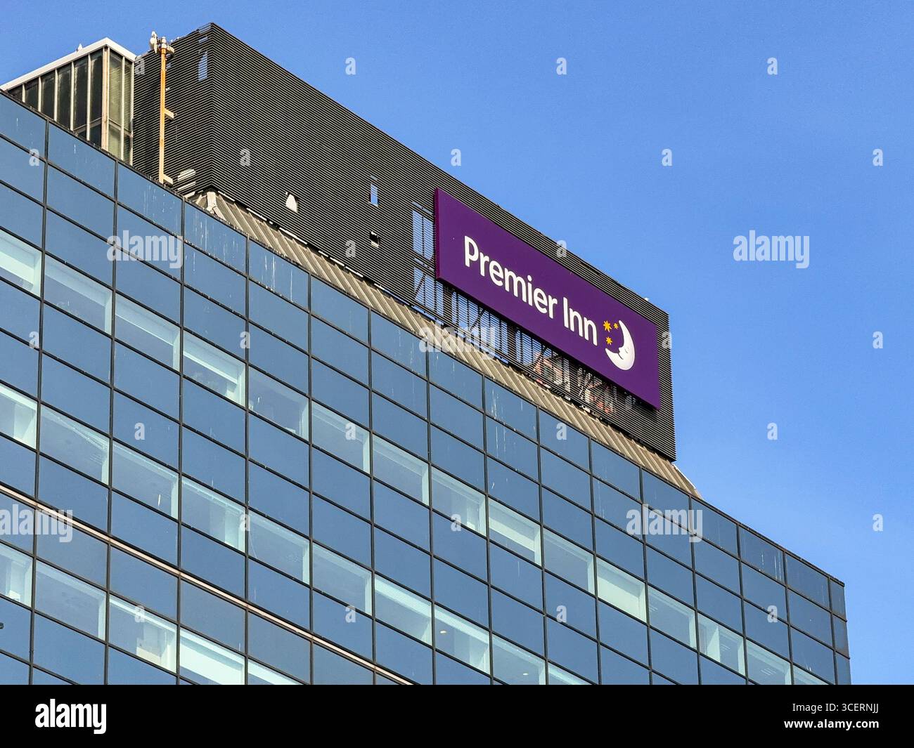 Cardiff, Wales, UK - 15 August 2025: Sign on top of one of the Premier Inn hotels in Cardiff city centre - Smartphone Captured Stock Image