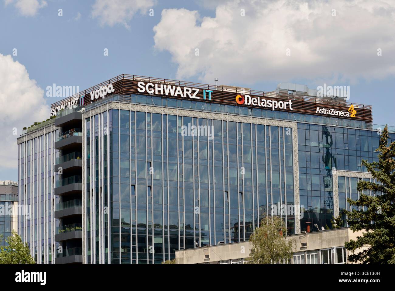 Schwarz IT, Yotpo., DelaSport, AstraZeneca logos on office building in Sofia Bulgaria, Eastern Europe, Balkans, EU Stock Photo