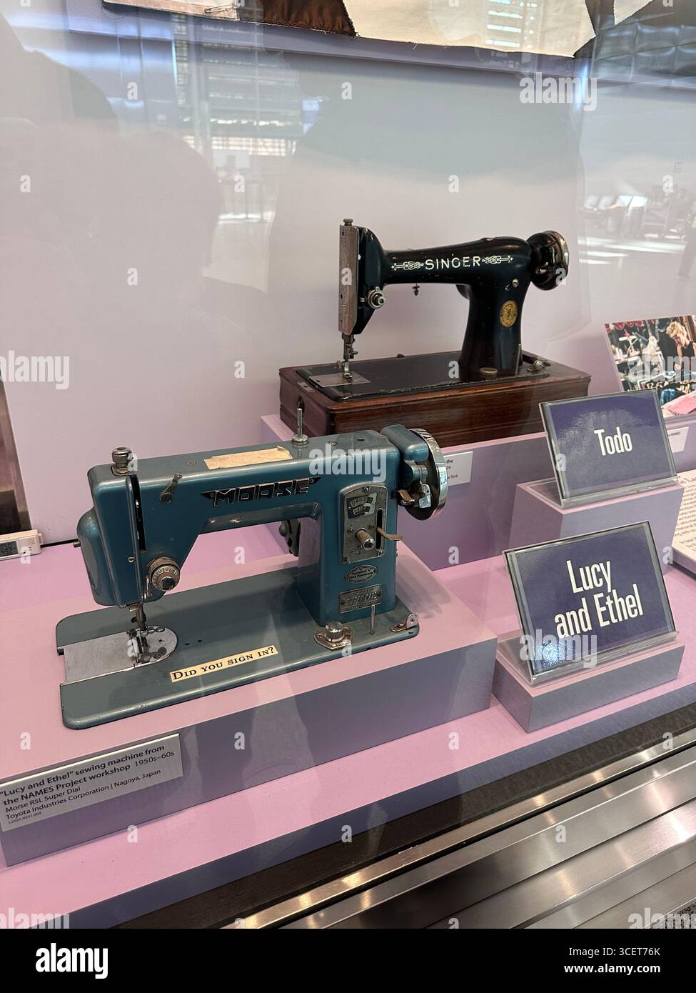 Singer and Morse vintage sewing machines displayed in museum exhibit, USA - Smartphone Captured Stock Image Singer and Morse vintage sewing machines displayed in museum exhibit, USA - Smartphone Captured Stock Image