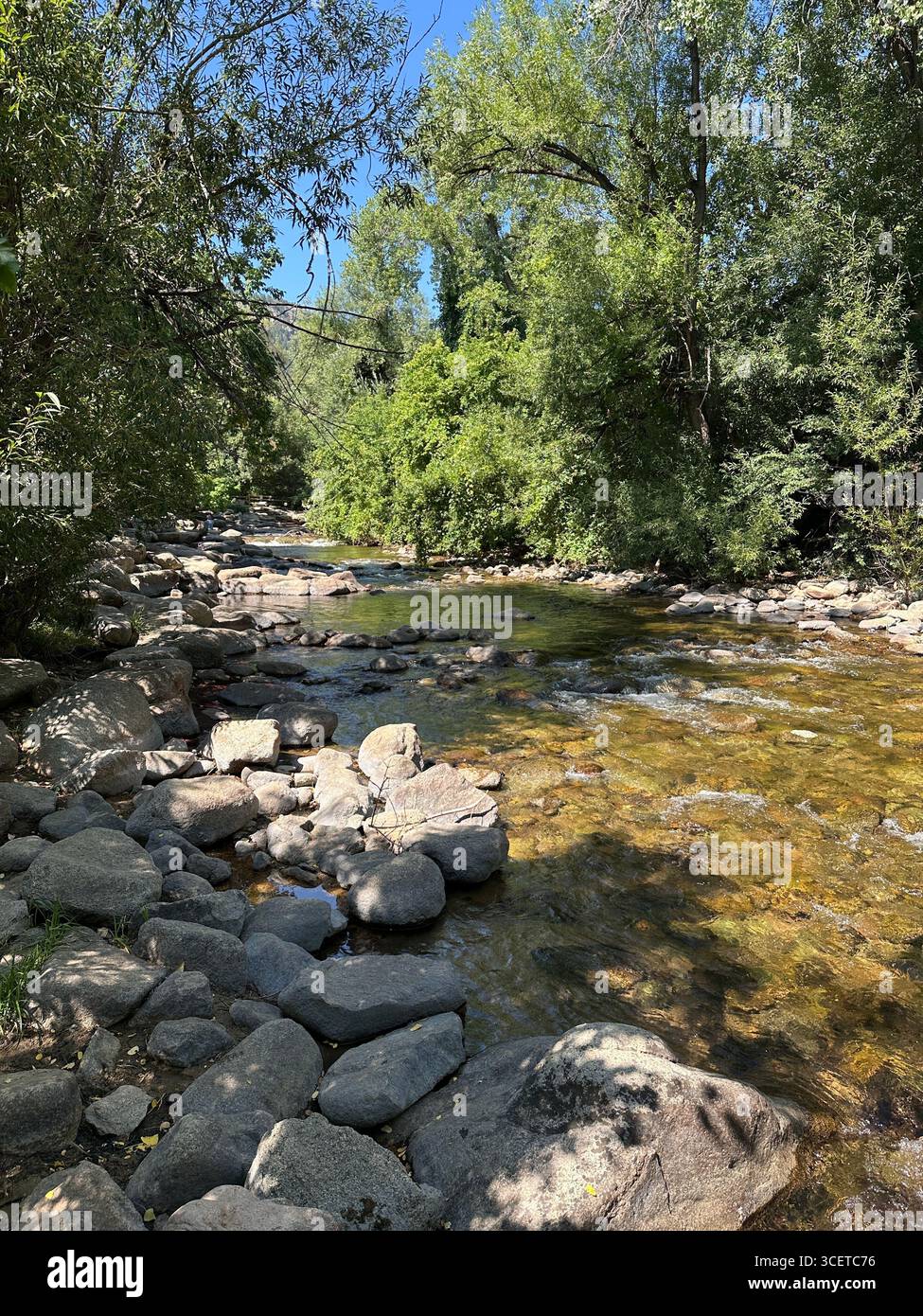 Boulder Creek in Boulder, Colorado, on a summer day. - Smartphone Captured Stock Image