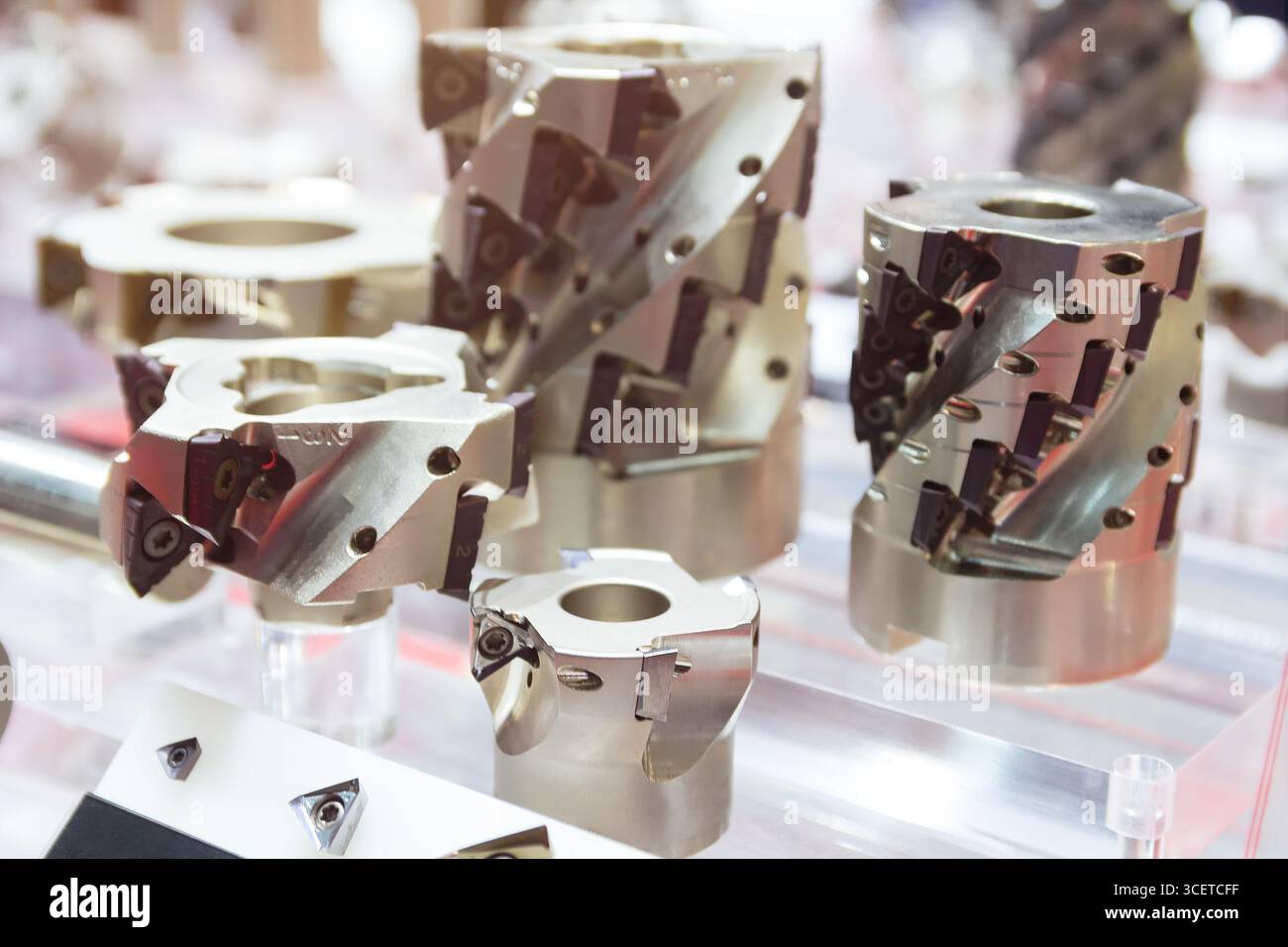 Various end cutters in the showroom. Metalworking, tools Stock Photo