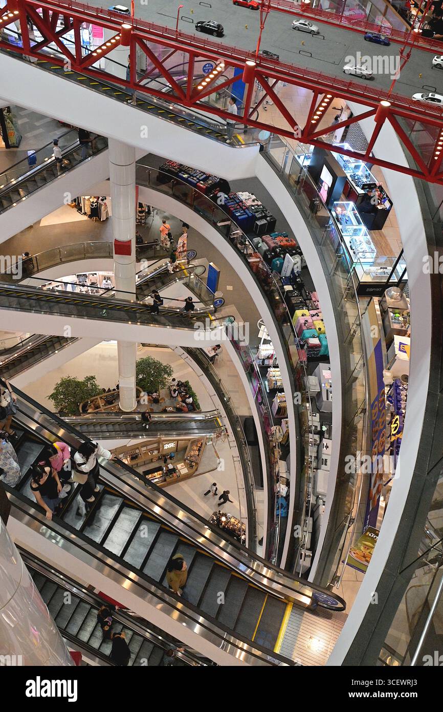 View of atrium at Terminal 21 Asok shopping mall, Bangkok with retail ...