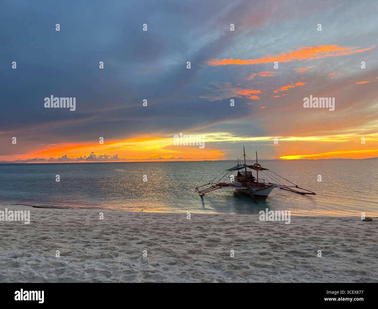 A serene and captivating scene of a fishing boat gently drifting on calm ocean waters during a golden sunset - Smartphone Captured Stock Image