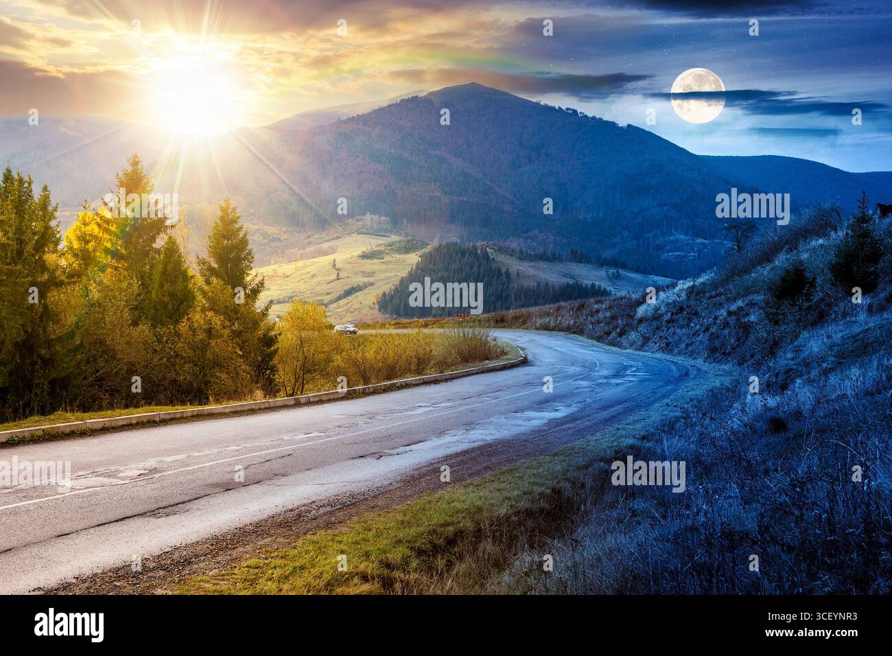 road through mountain landscape on autumn equinox. day and night time change concept. countryside scenery with sun and moon. spruce trees along asphal Stock Photo