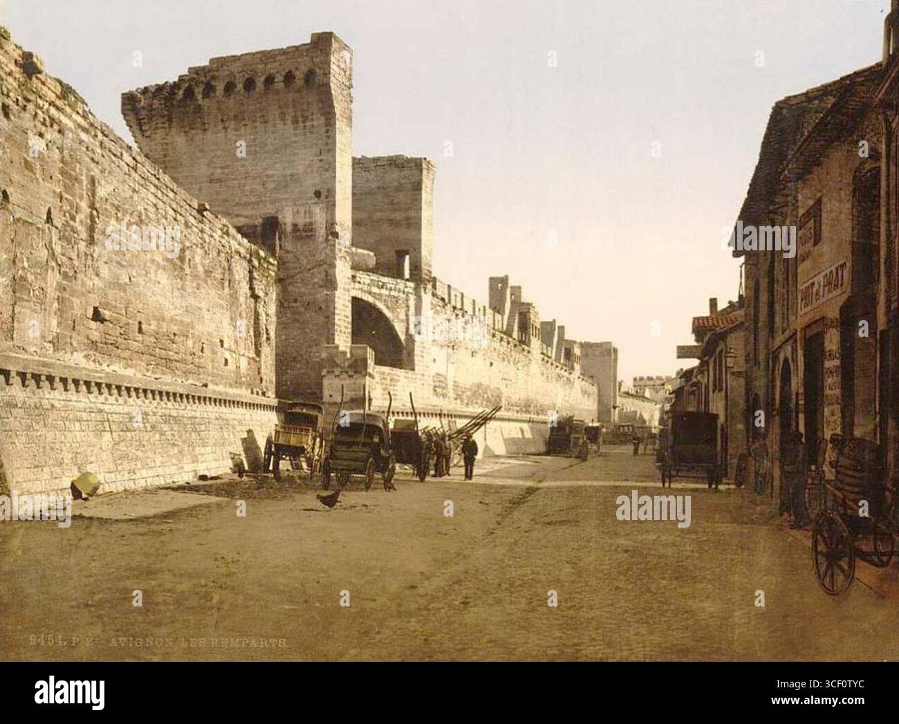 This 1890 image shows the ramparts of Avignon, a historic fortress town ...