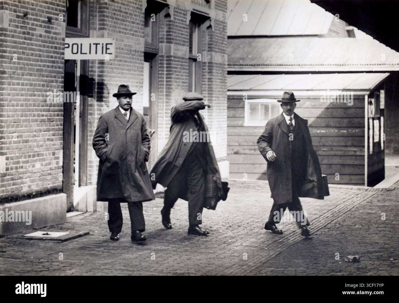 Police escorting handcuffs hi-res stock photography and images - Alamy