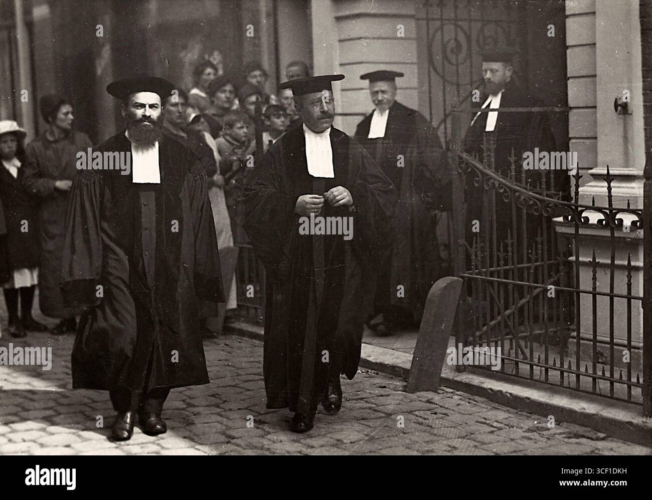 In 1919, four rabbis in ceremonial robes leave the synagogue following ...